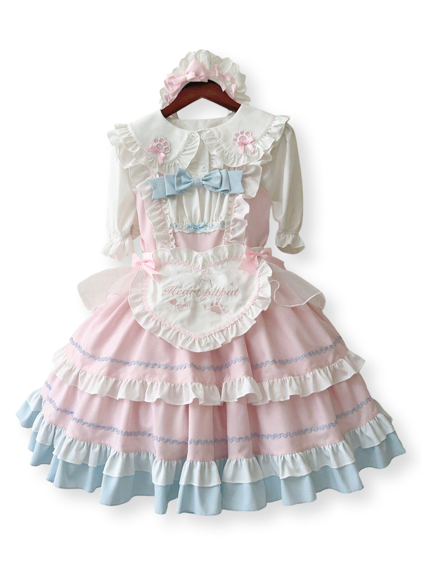 Sweet Lolita dress set in pink, white, and light blue with ruffles, apron, and matching headpiece.