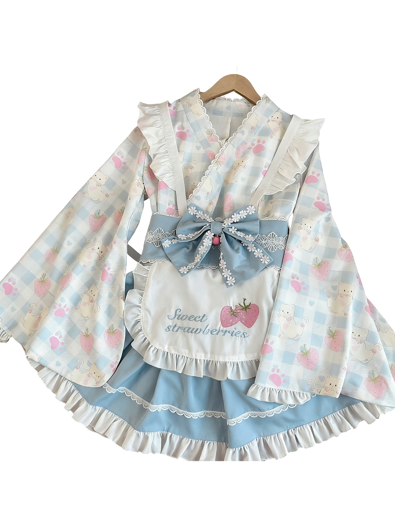 Sweet Lolita kimono-style dress in pastel blue gingham with cat, strawberry, and paw print, featuring a ruffled apron and large bow.