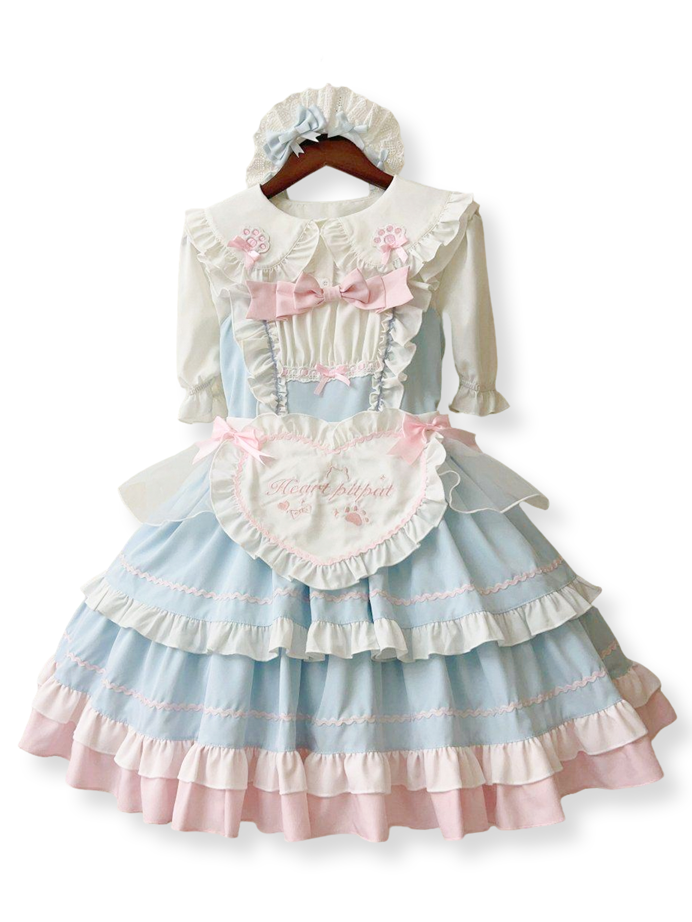 Sweet Lolita dress set with blue, pink, and white ruffles, apron, and bonnet.